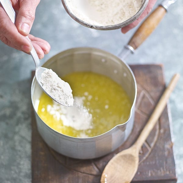 Add flour to the butter