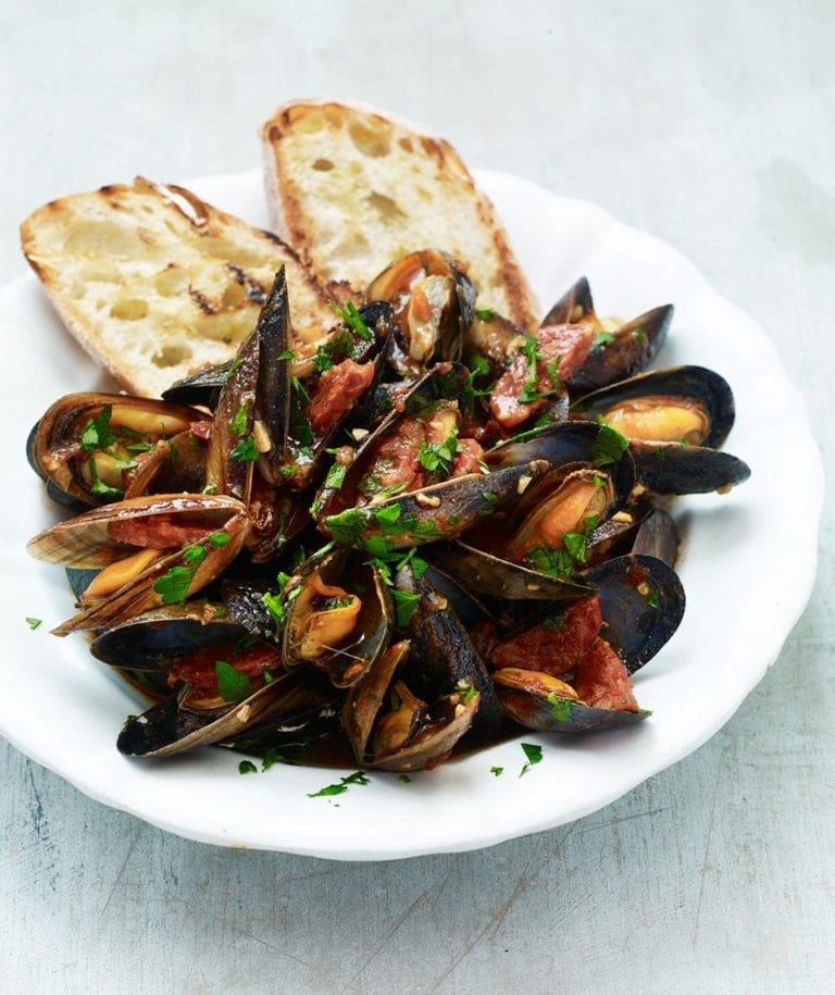 Mussel, tomato and chorizo ragù on garlic toasts