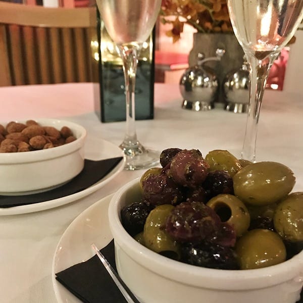 Image of olives and almonds at restaurant