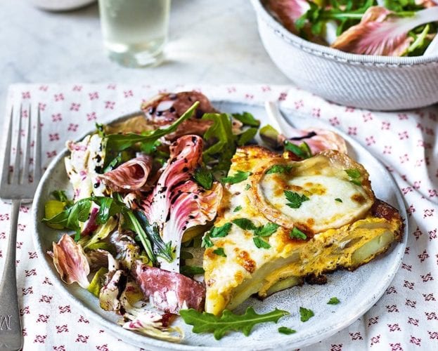 Cheesy potato frittata with radicchio, salami and olive salad 
