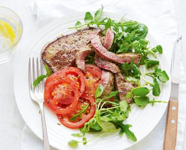Spice-rubbed steak and warm tomato salad