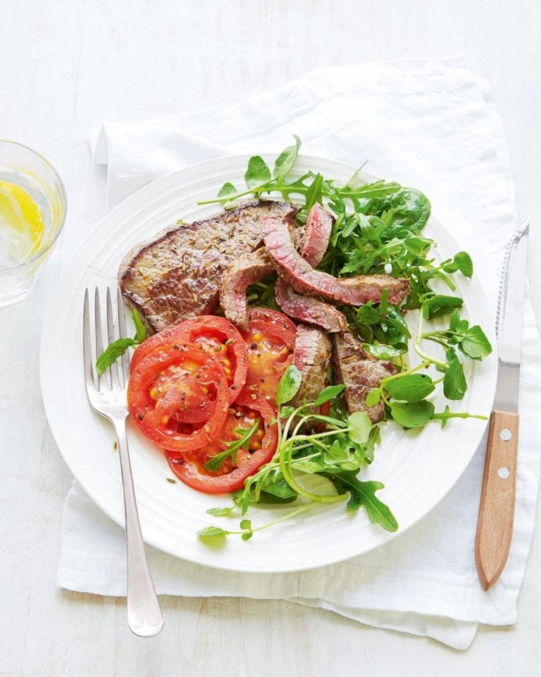 Spice-rubbed steak and warm tomato salad