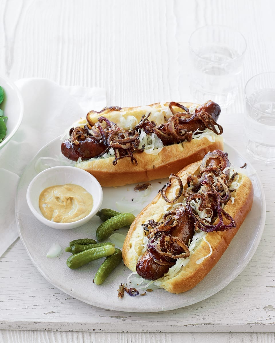 image of Hot Dogs With Sauerkraut and Crispy Fried Onions recipe by Delicious Magazine