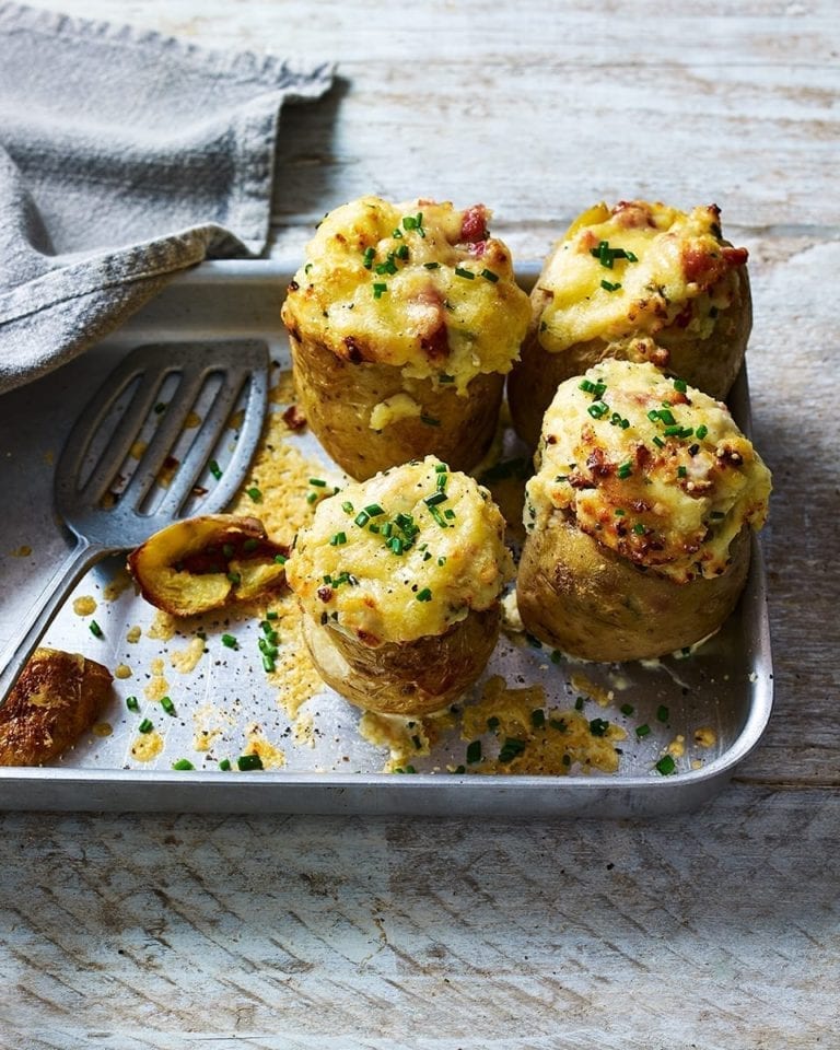 Cheese-stuffed jacket potatoes with cheese and bacon