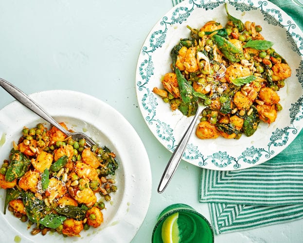 Gnocchi with sun-dried tomato pesto, peas and pecorino