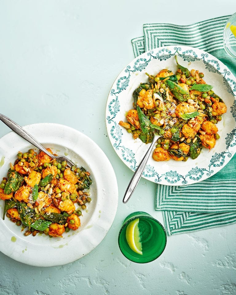 Gnocchi with sun-dried tomato pesto, peas and pecorino