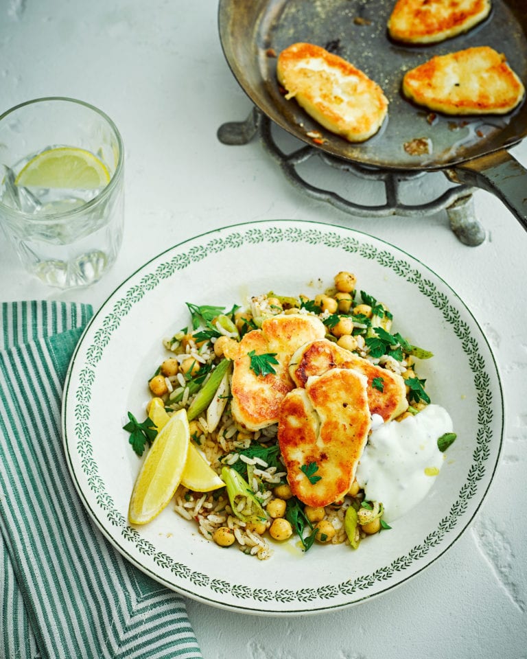 Fried halloumi with warm harissa, rice and chickpea salad