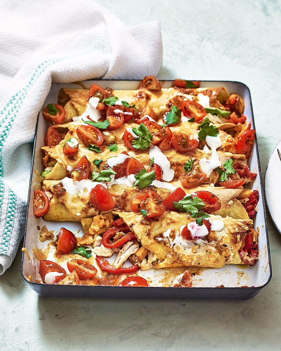 Sweet potato, red pepper and turkey enchiladas recipe | delicious. magazine