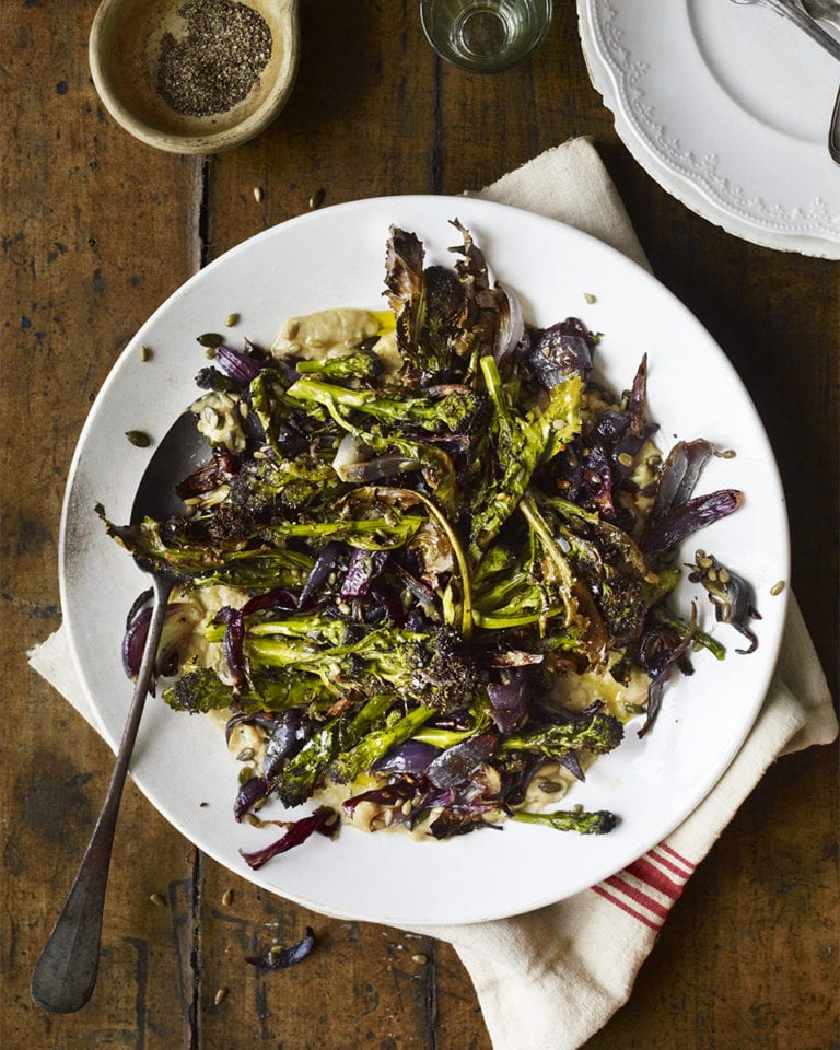 Roast purple sprouting broccoli with smashed white beans