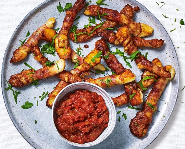 Pancetta-wrapped halloumi fries with smoky chilli tomato relish