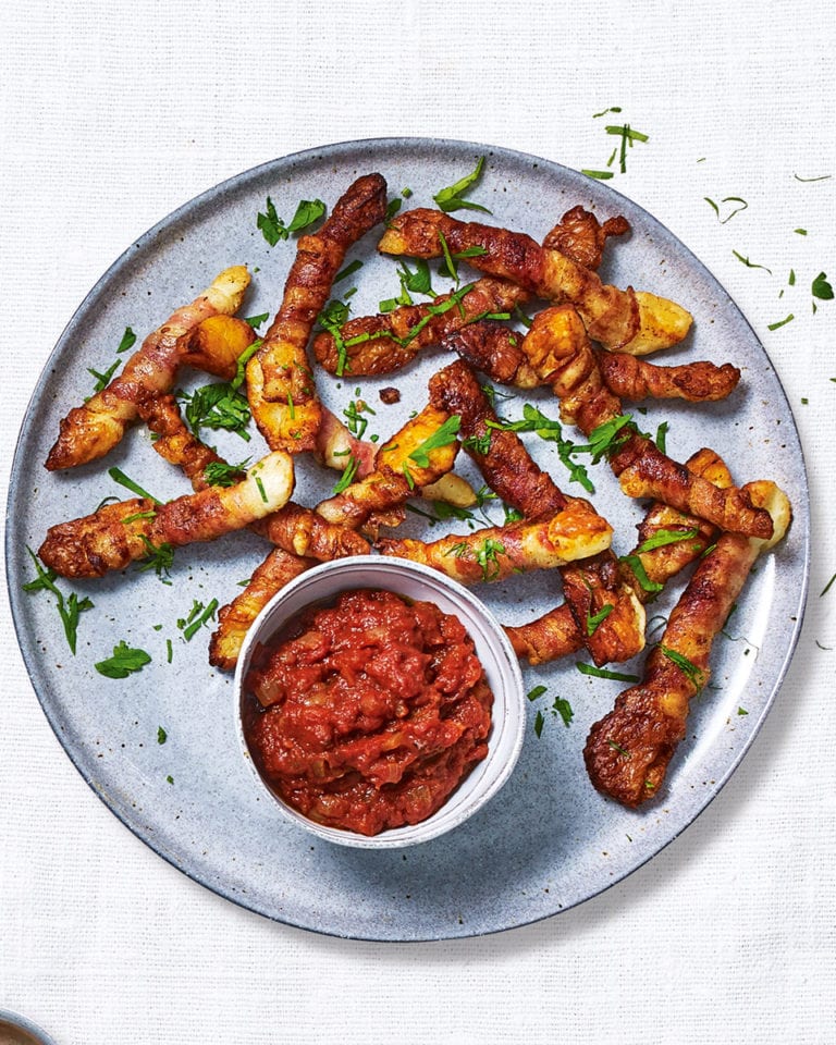 Pancetta-wrapped halloumi fries with smoky chilli tomato relish