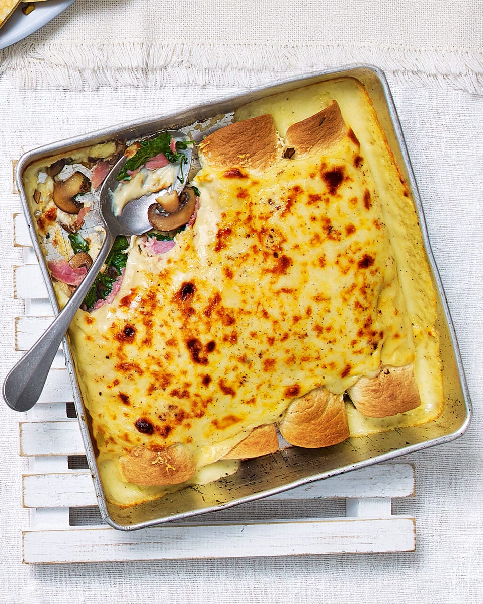 Cheesy ham, mushroom and spinach crêpes recipe | delicious. magazine