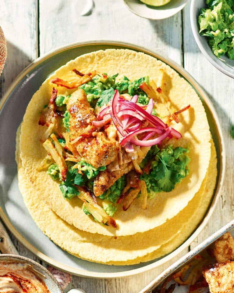 Fish and chip tacos with pea guacamole