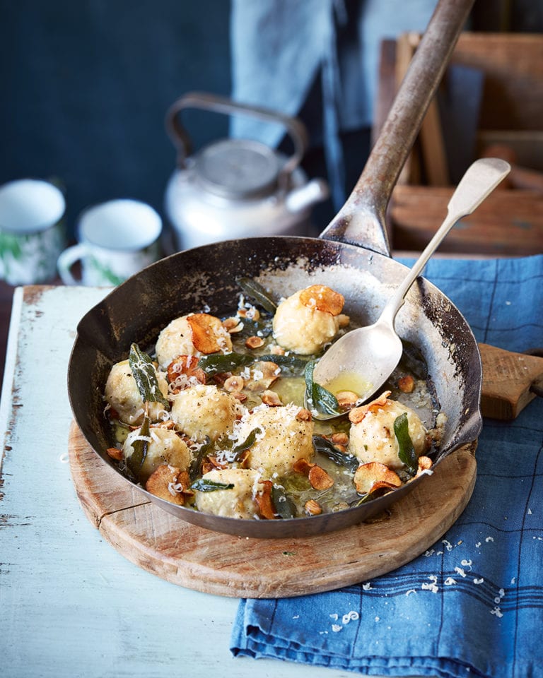 Gnudi with fried sage, hazelnuts and jerusalem artichoke crisps