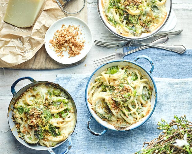 Baked pasta with peas, broad beans, fresh herbs and grana padano