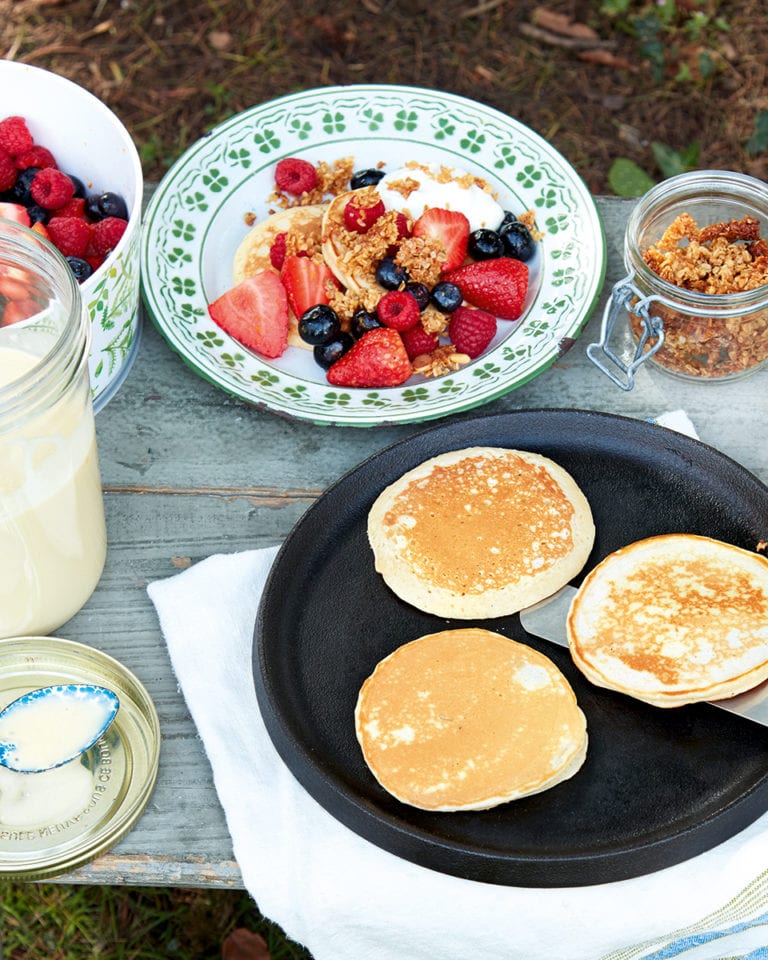 Jam jar pancakes with berries and crumbled flapjacks