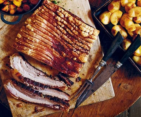 Slow-roasted pork with roasted apples and cider gravy
