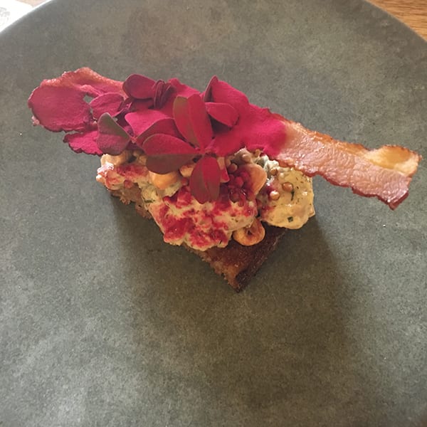 New potato and crispy pig’s ear smørrebrød at selma copenhagen