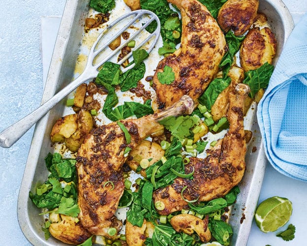 Berbere-spiced chicken, potato and greens traybake