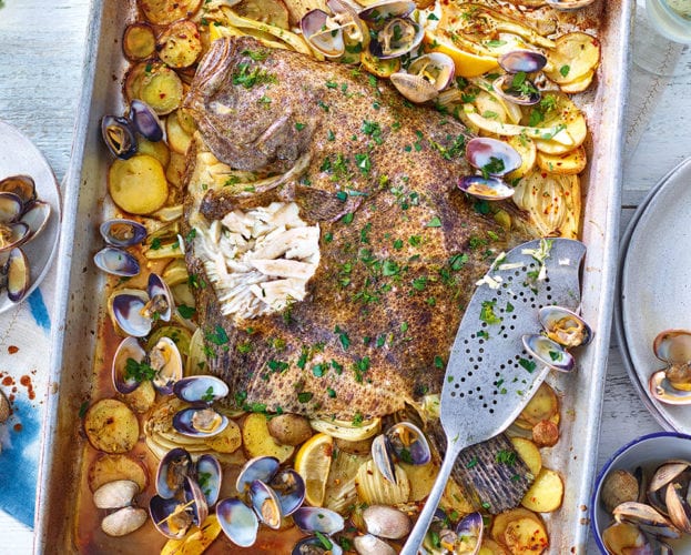 Whole roast turbot with clams, fennel and potatoes