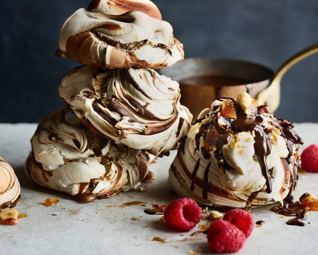 Chocolate swirl meringues with praline and chocolate caramel sauce