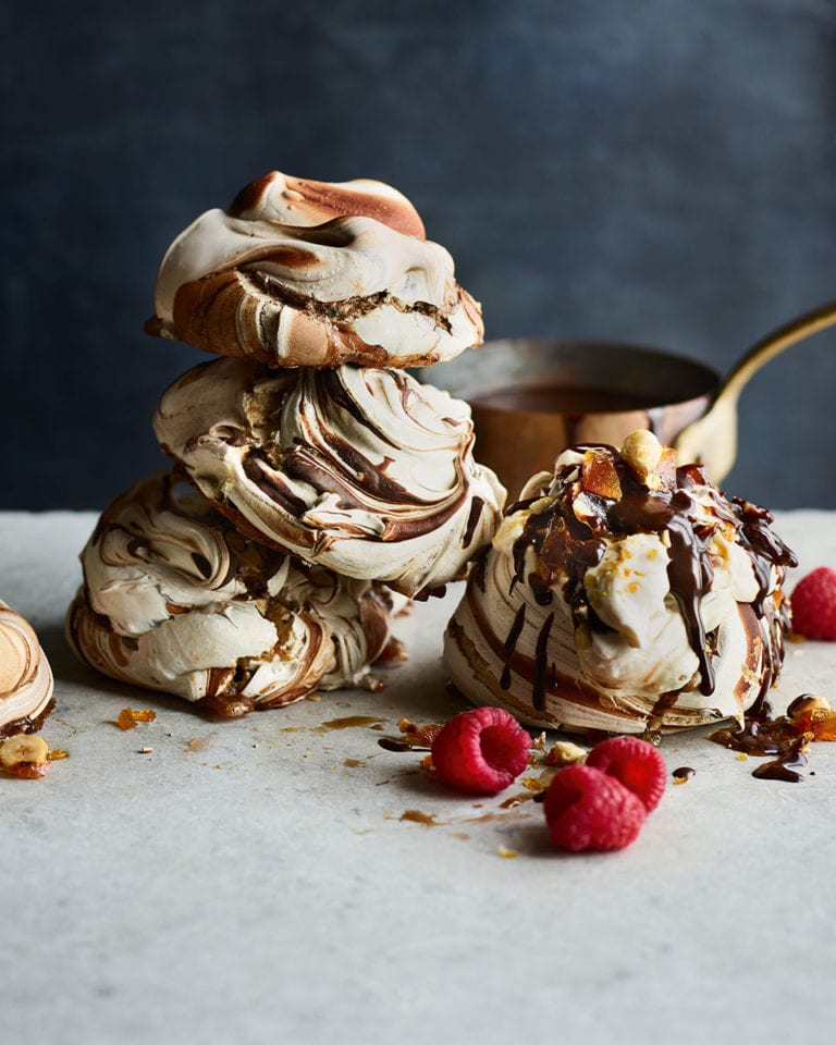 Chocolate swirl meringues with praline and chocolate caramel sauce