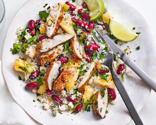 Jerk chicken with cauliflower rice and peas
