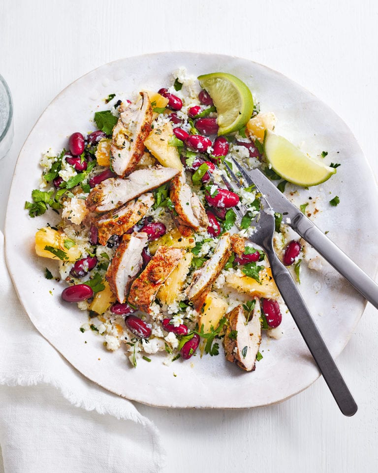 Jerk chicken with cauliflower rice and peas