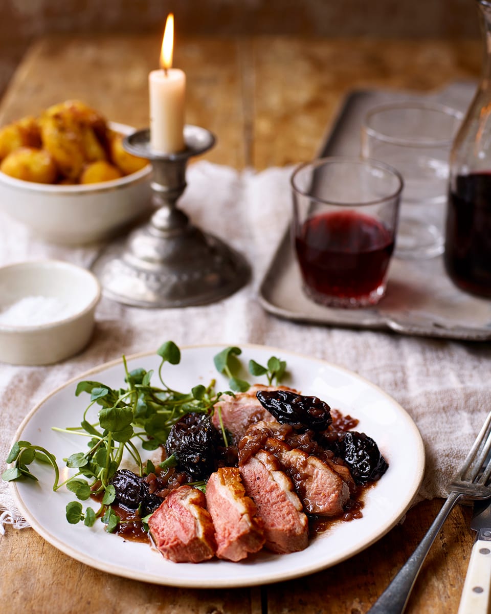 Roast duck breasts with prunes and armagnac recipe | delicious. magazine