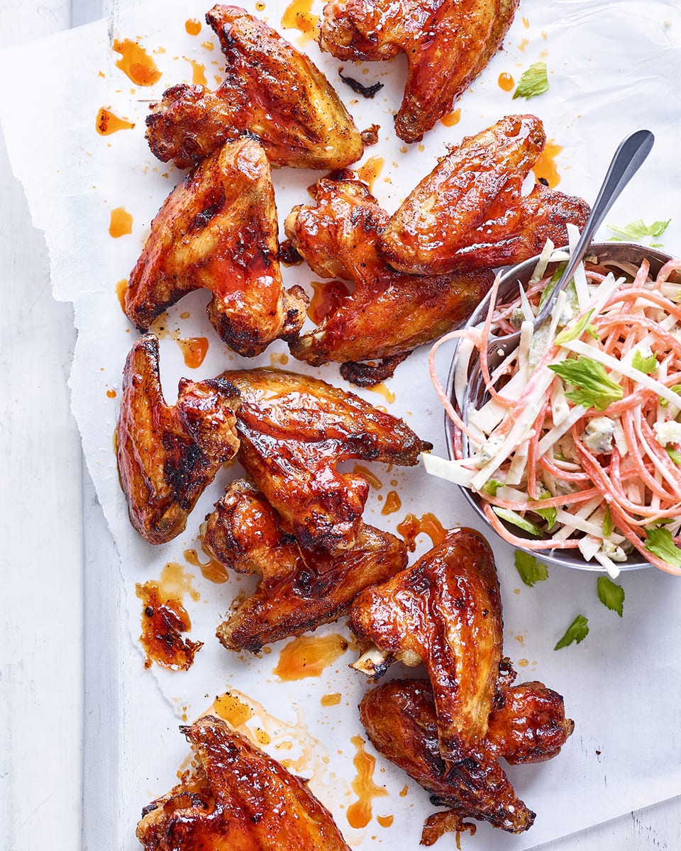 Buffalo chicken wings with blue cheese slaw recipe | delicious. magazine