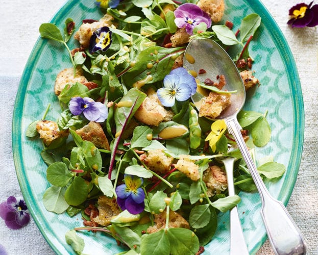Baby leaf salad with bacon and tarragon croutons and edible flowers