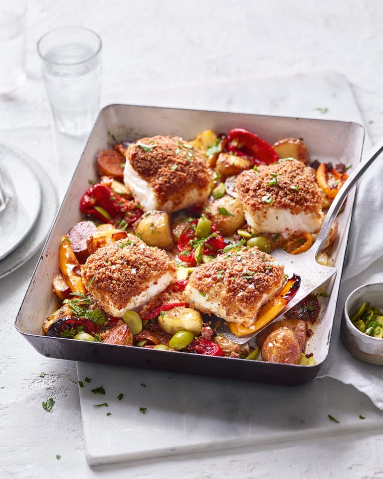 Chorizo-crumbed cod, pepper and olive traybake