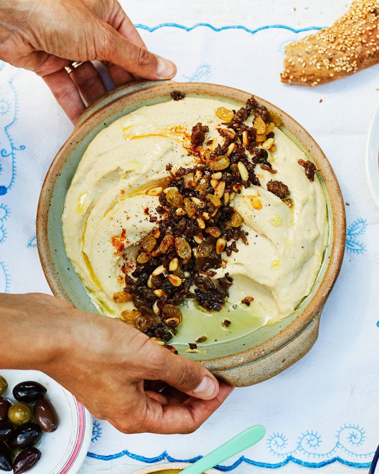 Crispy lamb, pine nut and raisin topped houmous