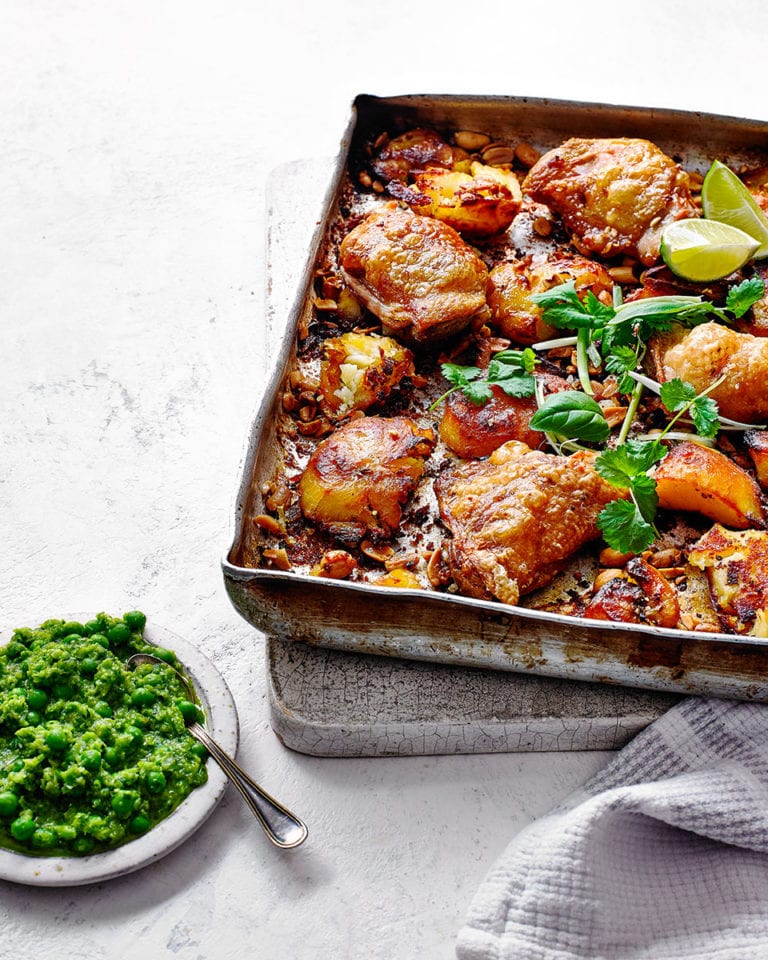 Chicken with peanut roasties and lime, pepper and pea sauce