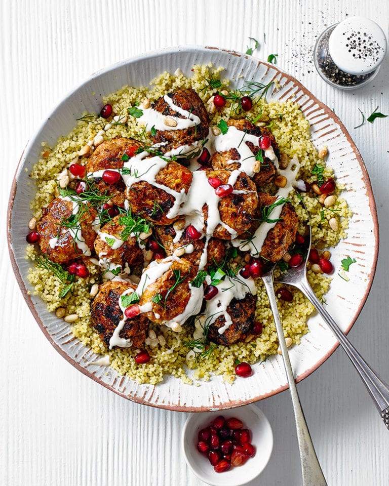 Harissa-spiced meatballs with houmous and pomegranate seeds