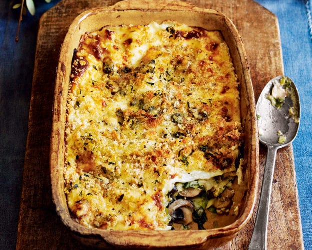 Kale, leek and mushroom lasagne with blue cheese topping