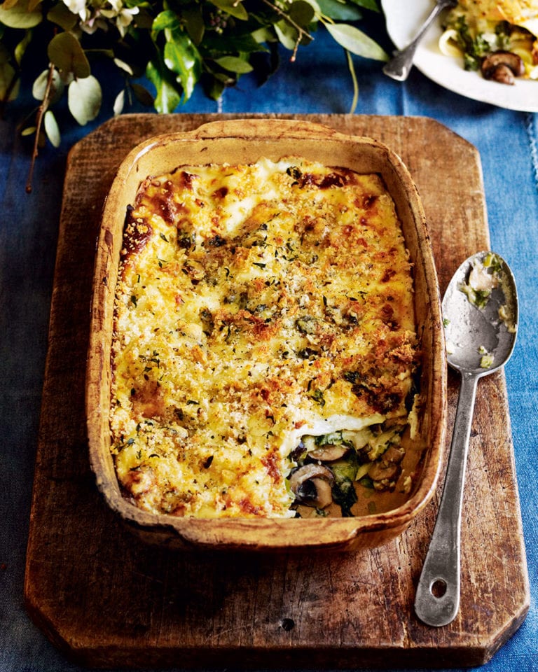 Kale, leek and mushroom lasagne with blue cheese topping