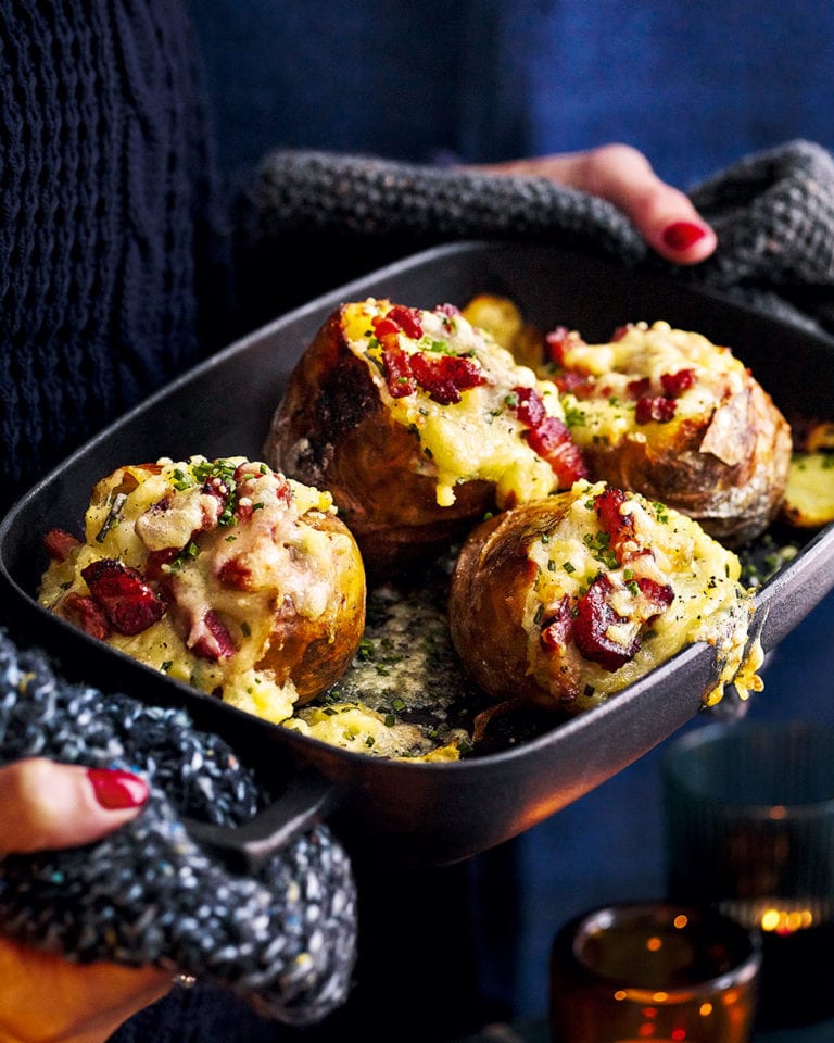 Baked potatoes stuffed with bacon, cheese and chives