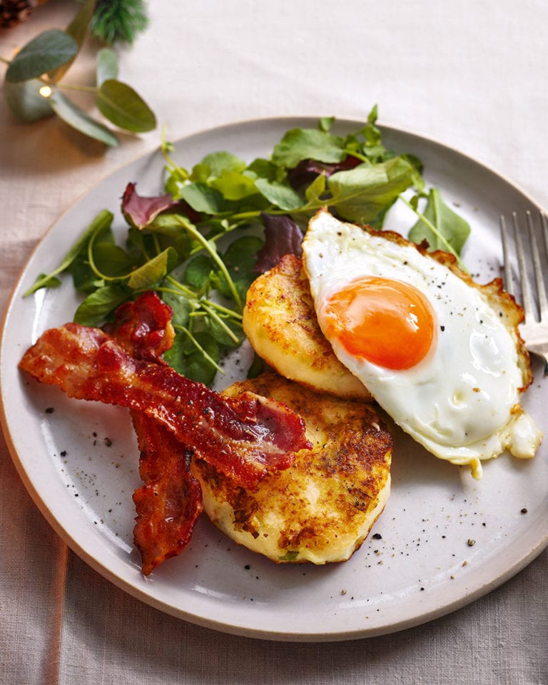 Potato champ cakes with crispy bacon and fried eggs