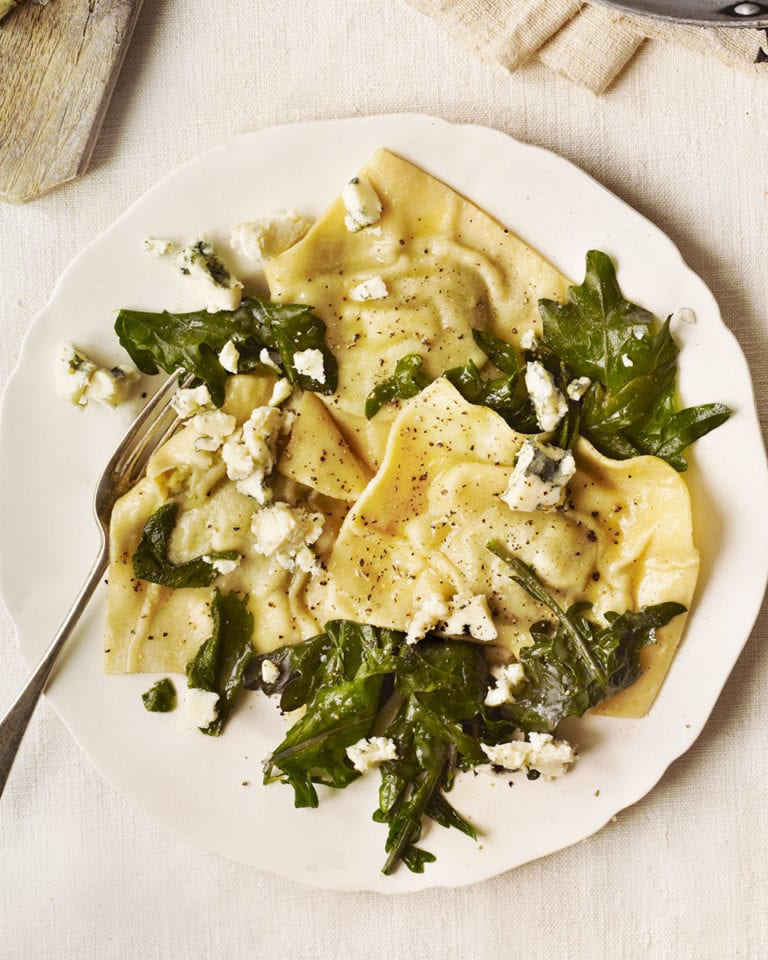 Celeriac and sage ravioli with kale and blue cheese