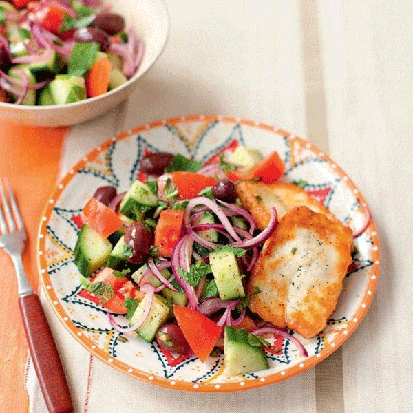 Greek salad with mint and fried halloumi