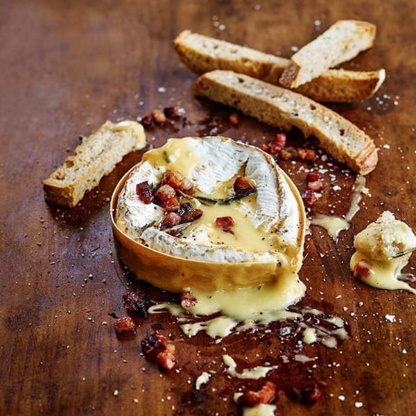 Baked camembert with crispy pancetta and sourdough sticks