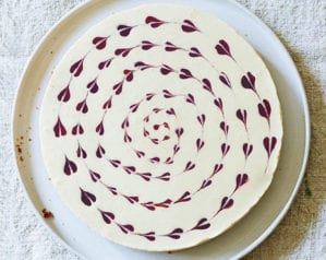 Lingonberry and orange cheesecake with a gingersnap crust