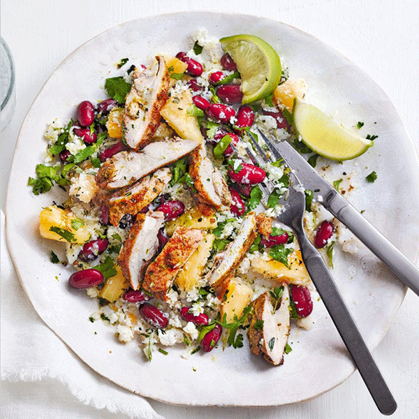 Jerk chicken with cauliflower rice and peas