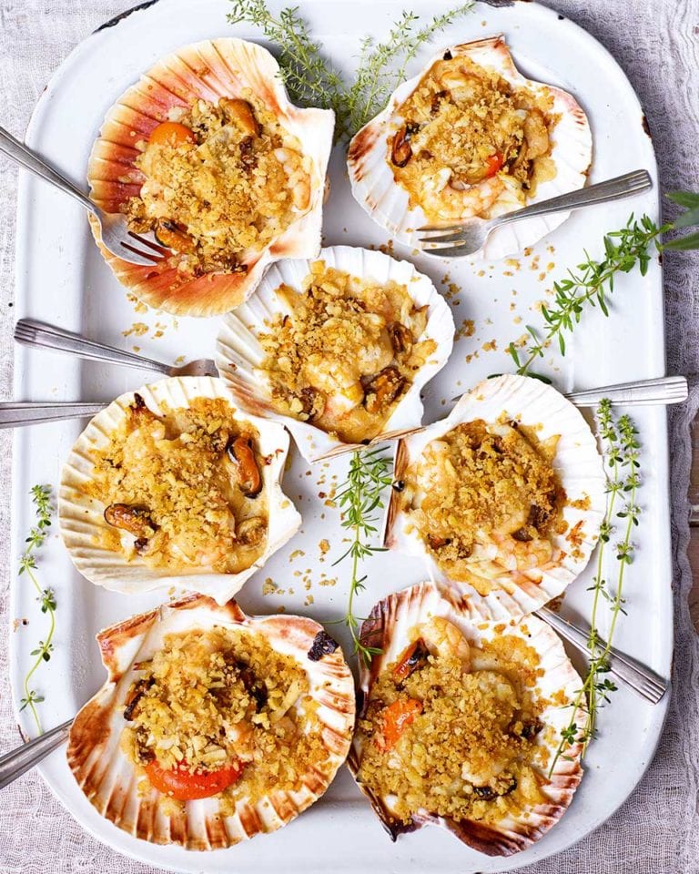 Scallop gratins with sea bass, mussels and prawns