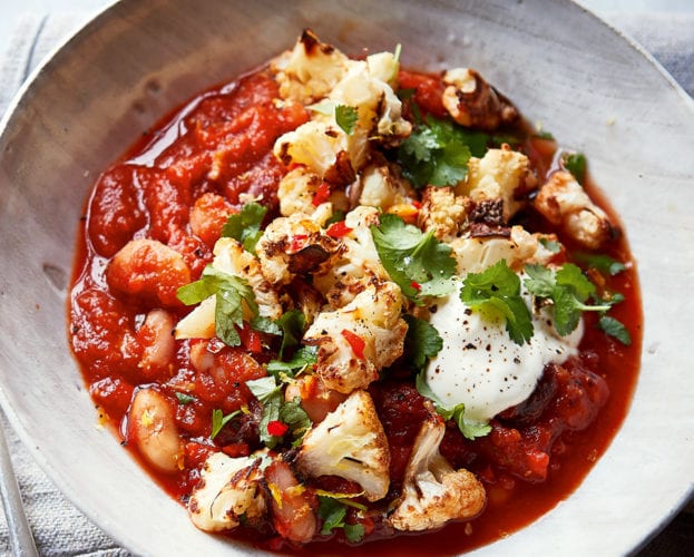 Spicy bean stew with crispy cauli topping