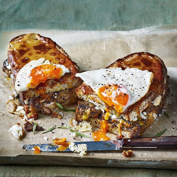 Mushroom Welsh rarebit toastie with a fried egg