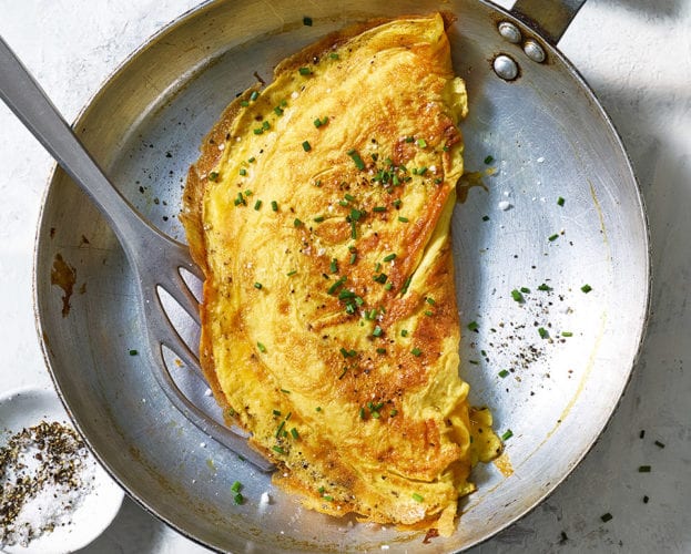 Herb and walnut frittata with tomato salad