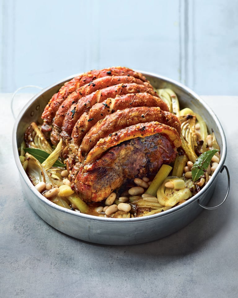 Slow-roast pork shoulder with leeks and cannellini beans