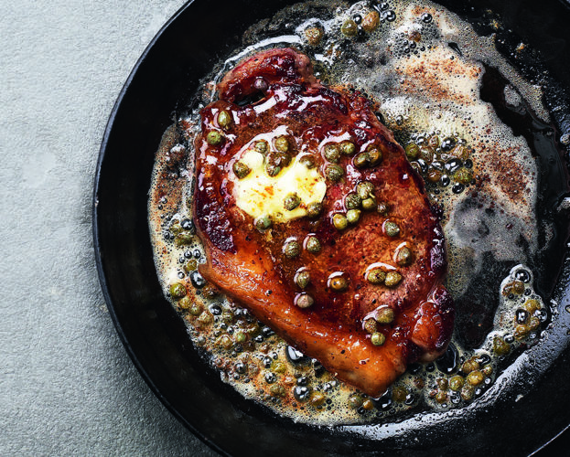 Steak with anchovy and caper butter